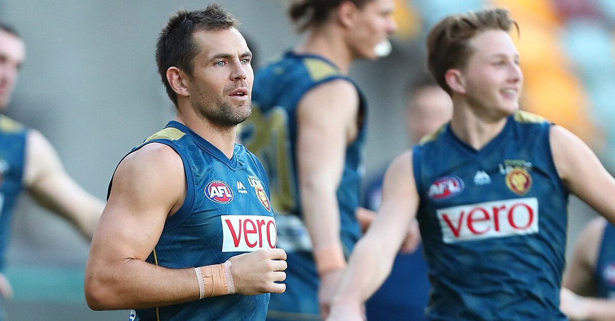 web hodgewitherden fagan.jpg Luke Hodge and Alex Witherden warm up during training. - Brisbane Lions